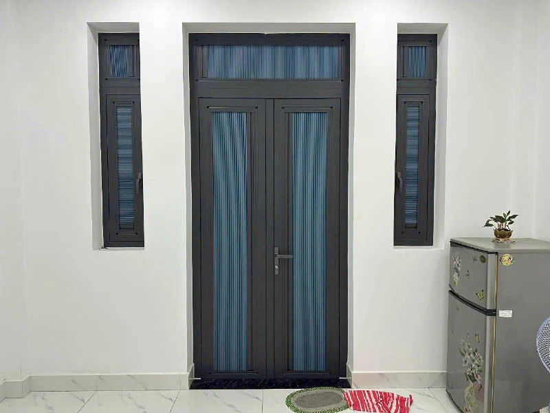 Rèm tổ ong gắn trong kính cửa đi